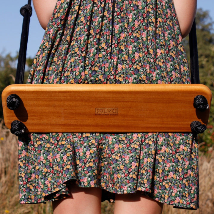 Detailed, close up view of the SOLVEJ Traditional Swing wooden board seat  with Black Rope from Australia