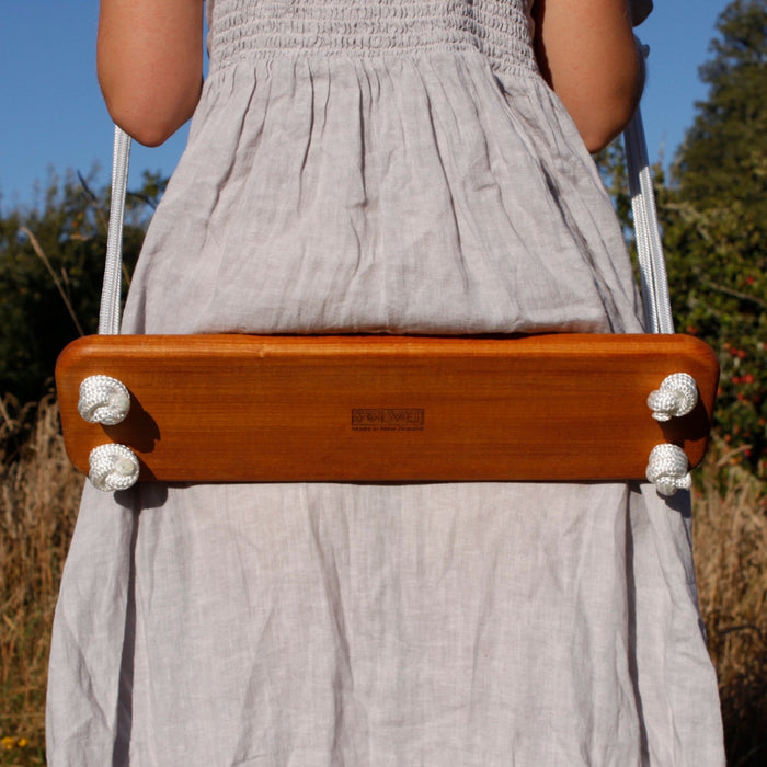 Detailed, close up view of the SOLVEJ Traditional Swing wooden board seat with White Rope from Australia