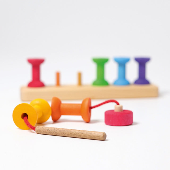 10316 Grimms Stacking Bobbins Small 8 pieces