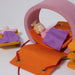 10880 Grimms Portable Doll House pink-orange