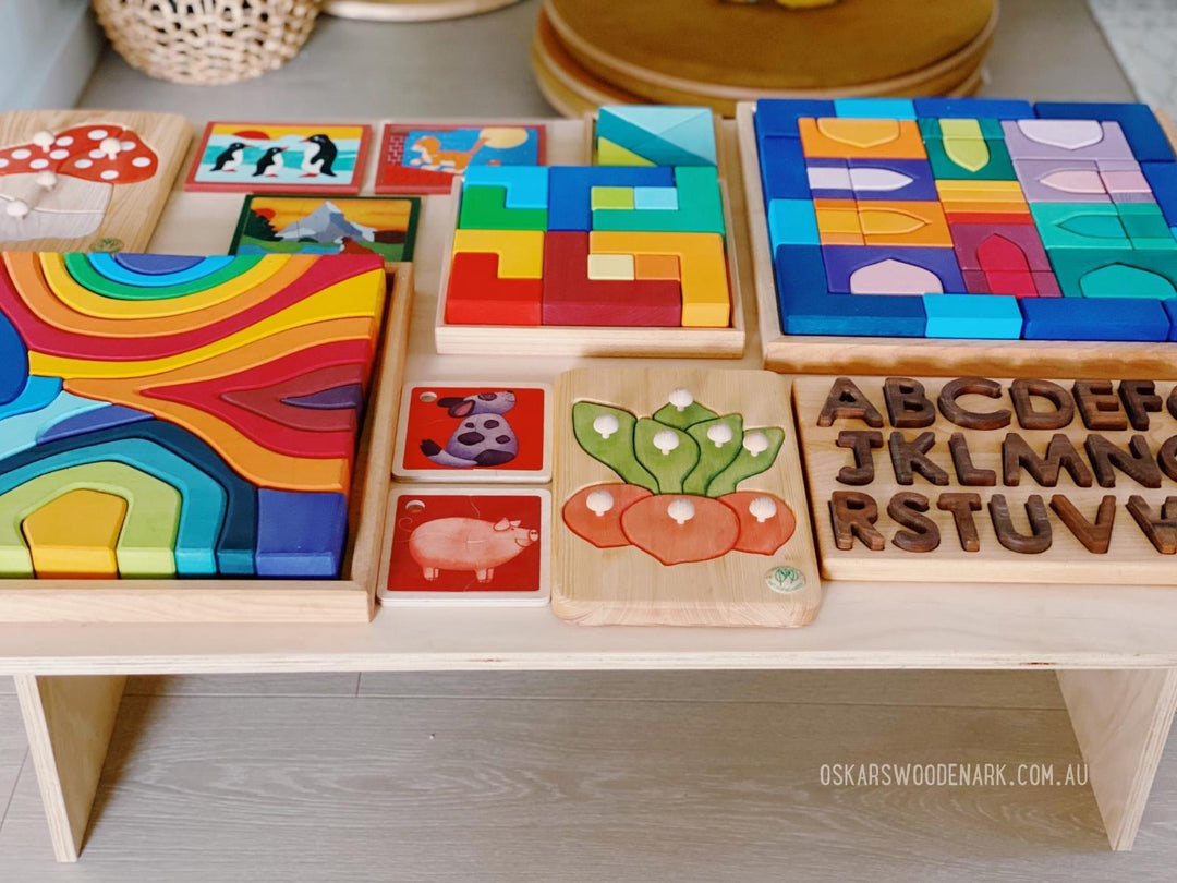 43210 Grimm's Square Puzzle with Grimm's Turquiose Tangram and Building Sets, Weizenkorn Puzzle and Mini Puzzles, Drei Blaetter Peg Puzzles and Treasures from Jennifer Capital Alphabet Puzzle Walnut