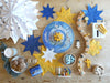   Waldorf Family Advent Wheel with Grimm's Celebration Ring Natural, Grimm's Candle Holders Brass and Aluminum, Grimm's Candles Amber, Grimm's Candle Holder Decorations Snowman and Angel, Graupner Small Candles White, Graupner Candle Holder Angel and The Nativity, Grapat Mandala Snowflakes and Mercurius Waxed Kite Paper