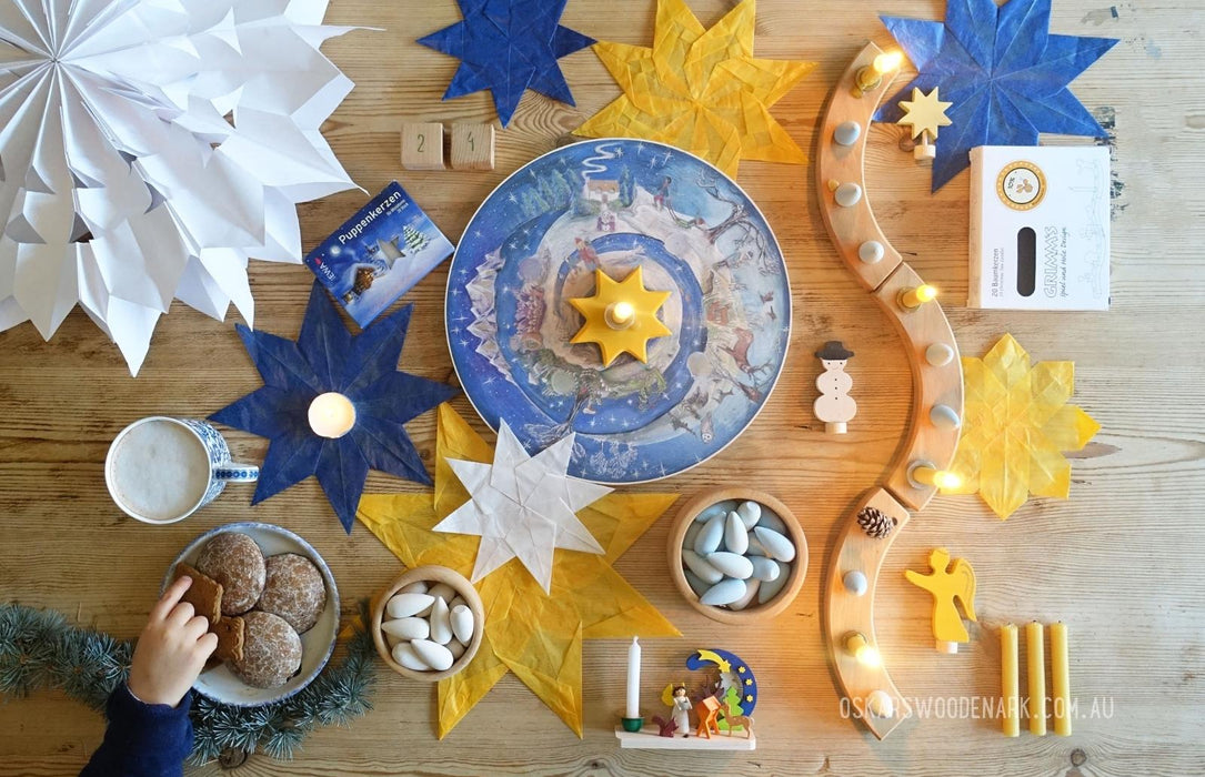   Waldorf Family Advent Wheel with Grimm's Celebration Ring Natural, Grimm's Candle Holders Brass and Aluminum, Grimm's Candles Amber, Grimm's Candle Holder Decorations Snowman and Angel, Graupner Small Candles White, Graupner Candle Holder Angel and The Nativity, Grapat Mandala Snowflakes and Mercurius Waxed Kite Paper