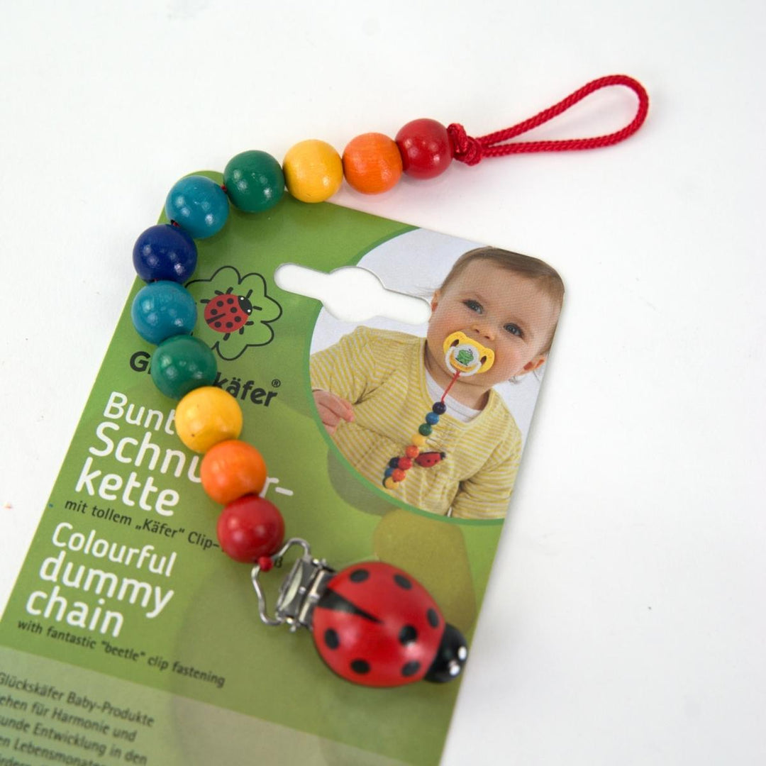 NI-520080 Gluckskafer Wooden dummy chain w ladybird clip - Rainbow